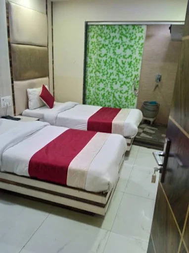 Family room with two queen beds at Hotel Delhi Empire DX, Paharganj